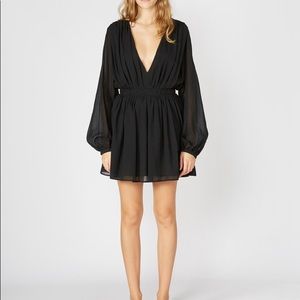 Matin black puff sleeve v neck flowy dress